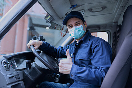 RKI truck driver with face mask